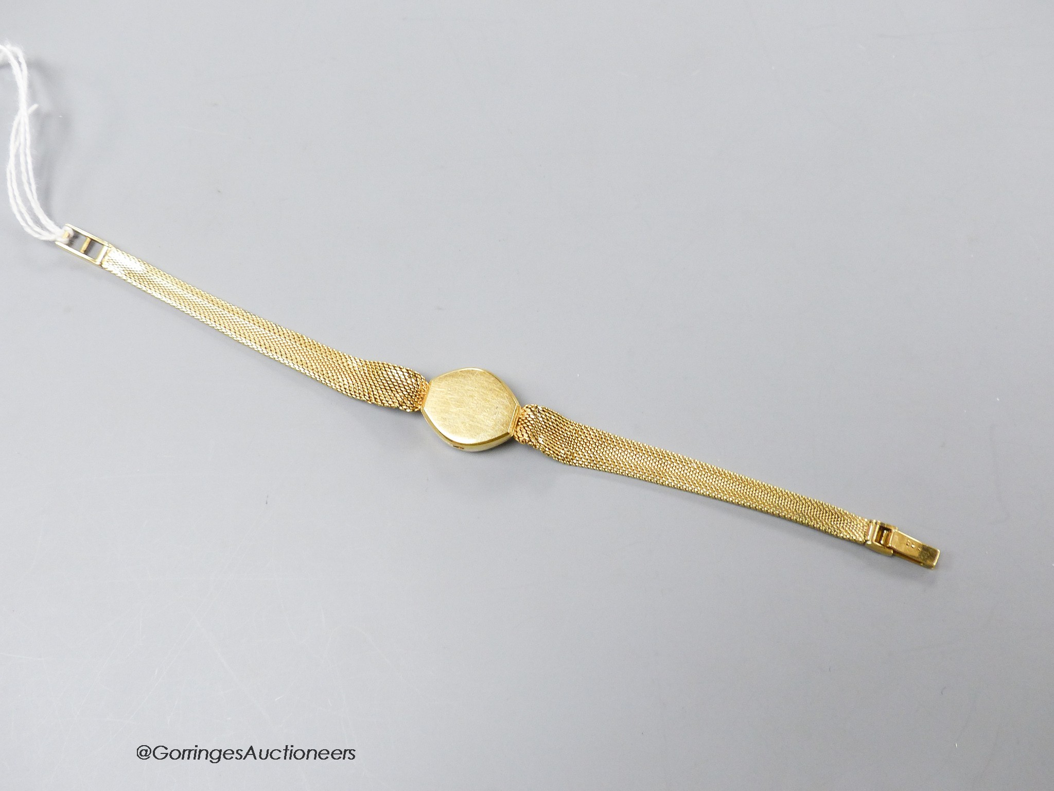 A lady's yellow metal (stamped 585) wrist watch case and strap (no movement), gross 14.6 grams.